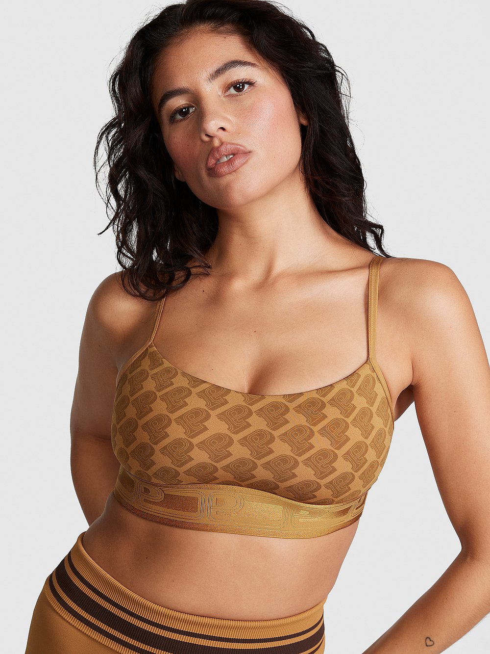 Victoria's Secret, PINK Ultimate Scoop Sports Bra, Golden Oak Logo, onModelFront, 1 of 4 Isabella is 5'9" and wears 36B or Medium