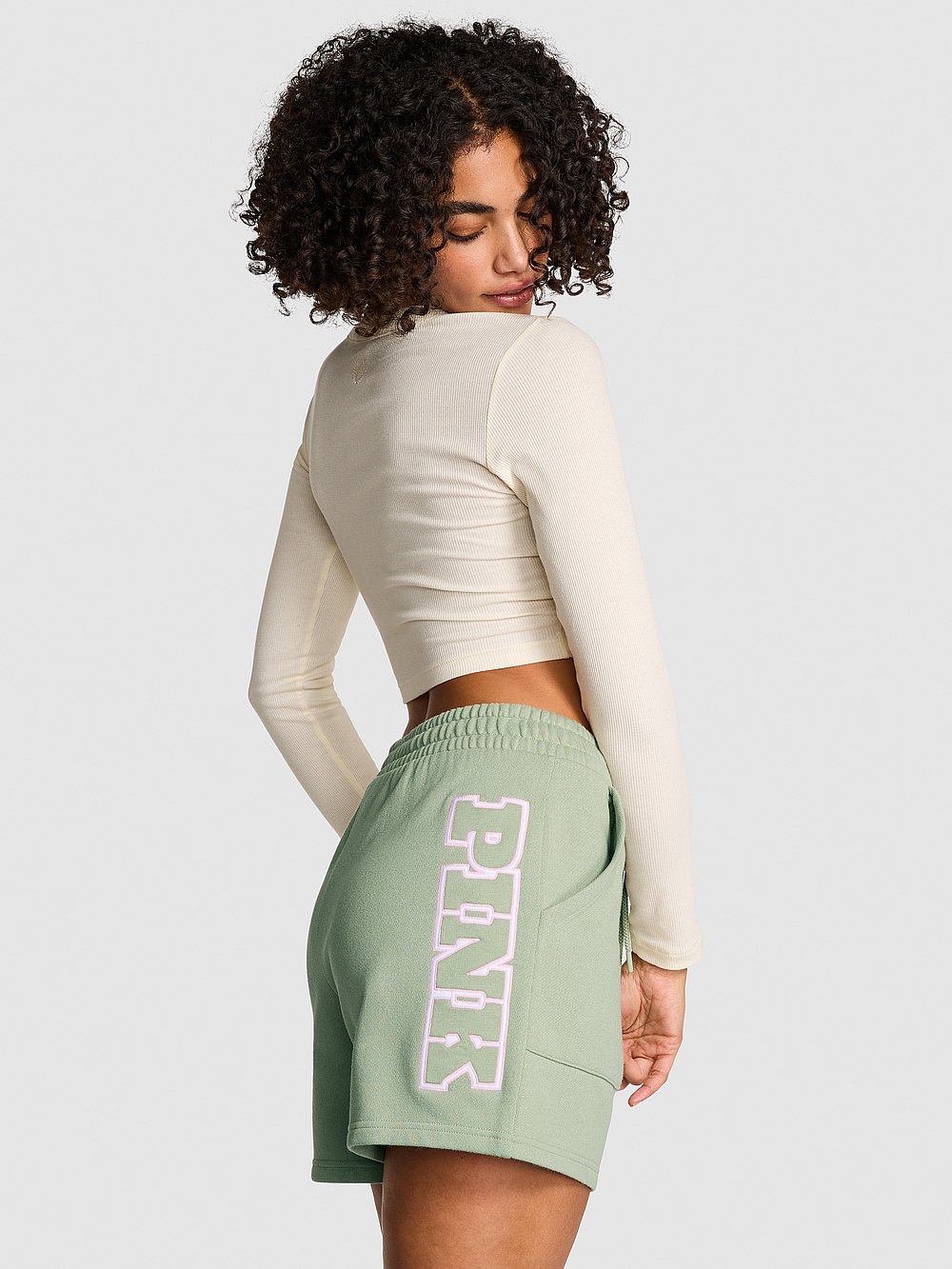 PINK Ivy Fleece Classic Shorts, Green Garden, featured, 1 of 4 Vanessa is 5'10" and wears Small