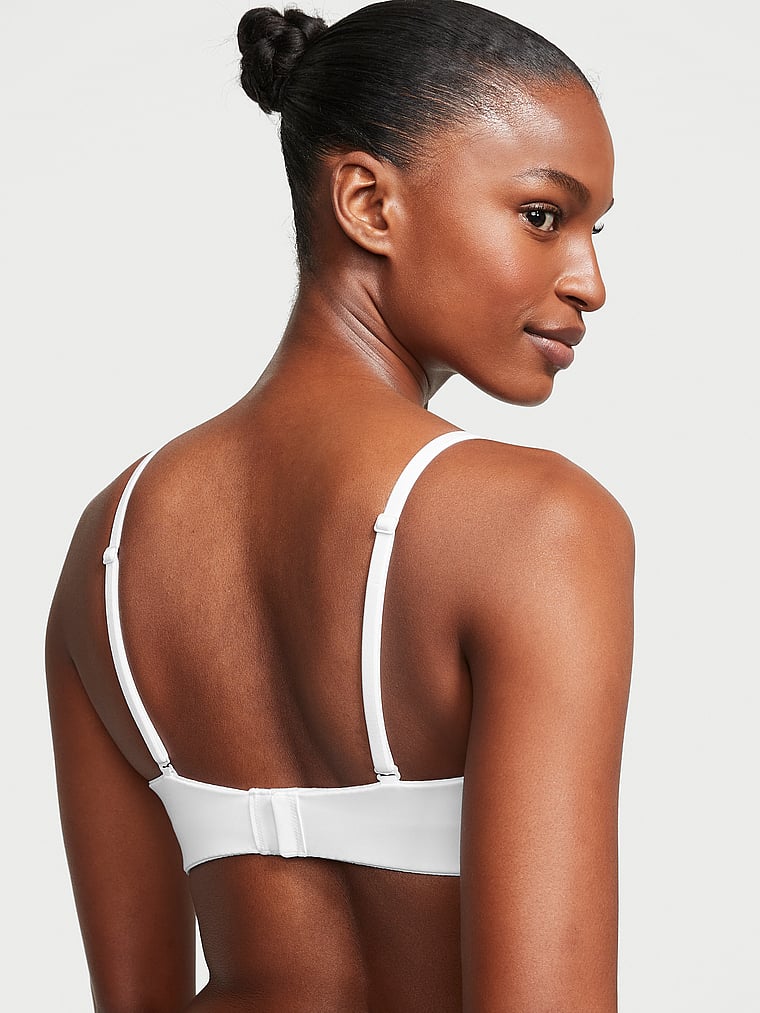 Victoria's Secret, Body by Victoria Lightly Lined Smooth Strapless Bra, White, onModelBack, 2 of 4 Tsheca  is 5'9" and wears 34B or Small