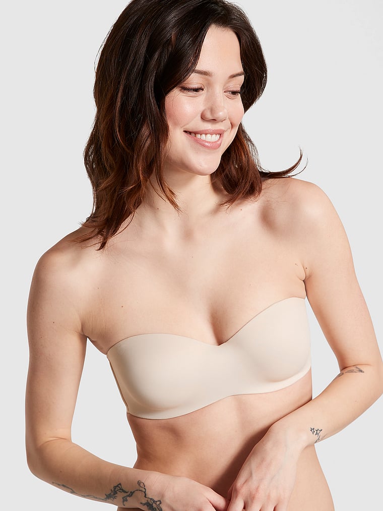 PINK Wear Everywhere Wear Everywhere Lightly Lined Strapless Bra, Marzipan, onModelFront, 1 of 3 Sofia is 5'10" or 178cm and wears 34B or Small