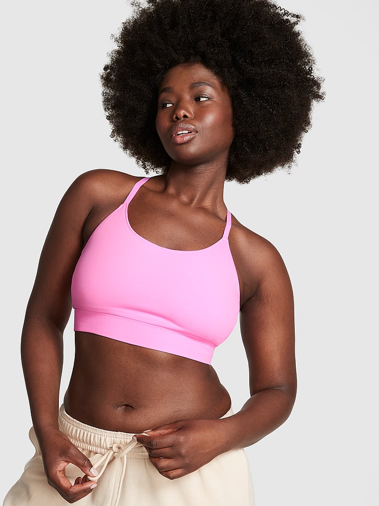 PINK Seamless Scoop Sports Bra, Lola Pink, onModelFront, 1 of 4 Fanta is 5'11" or 180cm and wears 34D or Medium