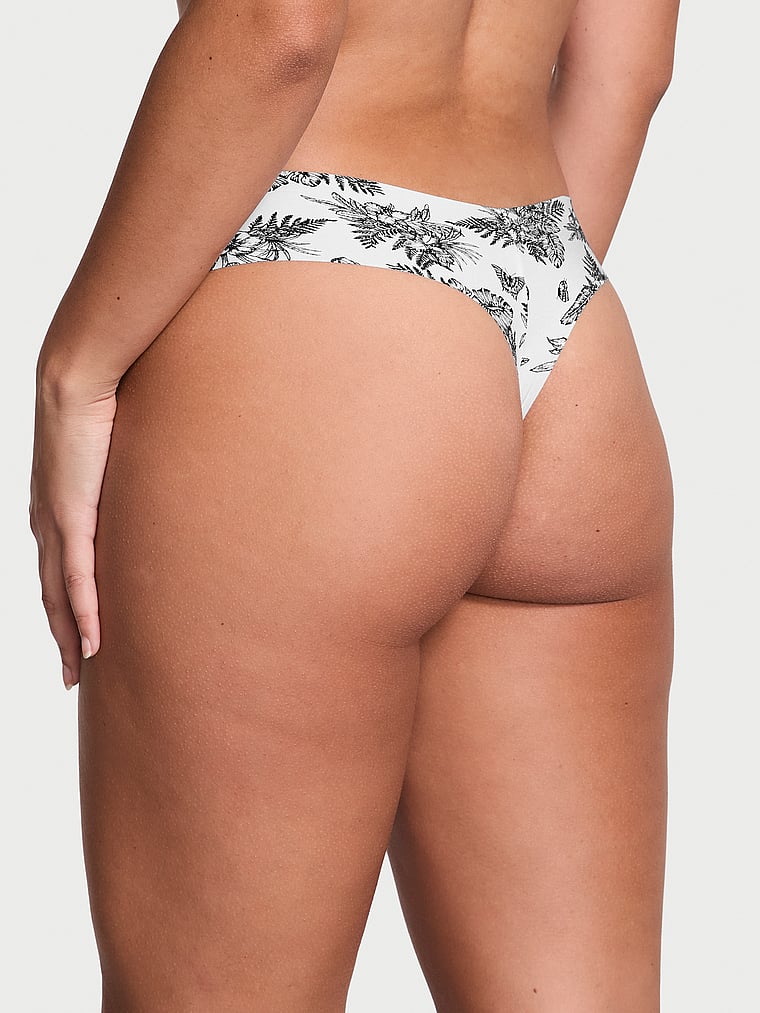 Victoria's Secret, No-Show No-Show Thong Panty, VS White Tropical Toile, onModelBack, 2 of 3 Eden is 5'8" and wears Large
