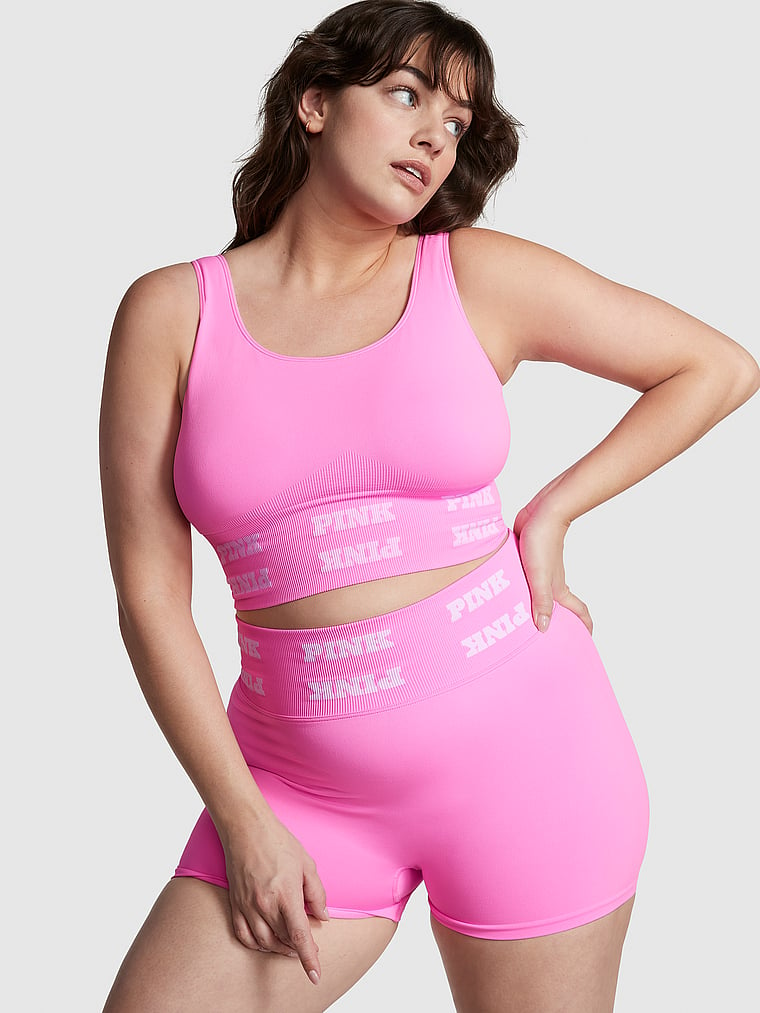 PINK Seamless Logo Sports Bra, Lola Pink, onModelSide, 3 of 4 Sixtine  is 5'7" or 170cm and wears 36D or Medium