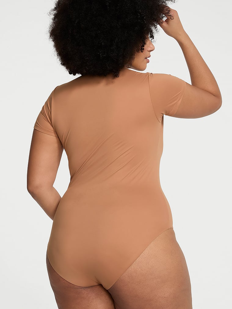 Victoria's Secret, Victoria's Secret Feathersoft Essentials Short-Sleeve Bodysuit, Toffee, onModelBack, 2 of 3 Shadia  is 5'11" and wears Extra Extra Large