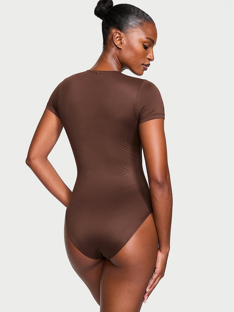 Victoria's Secret, Victoria's Secret Feathersoft Essentials Short-Sleeve Bodysuit, Brown, onModelBack, 2 of 3 Tsheca  is 5'9" and wears Small