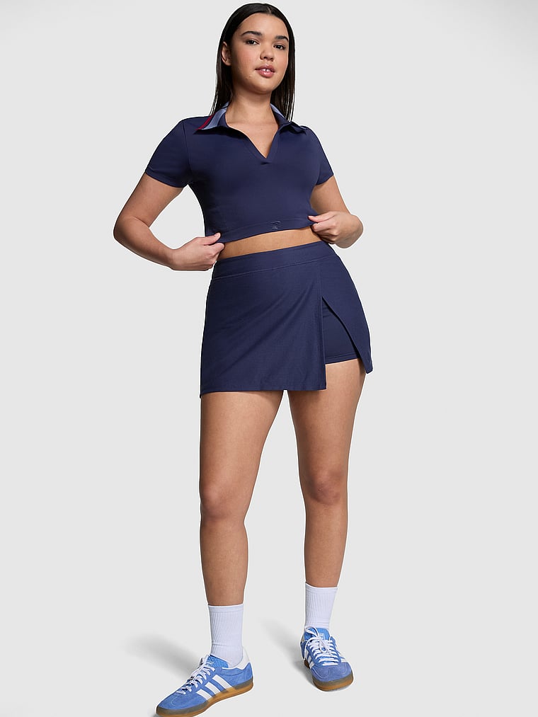 PINK Piqué Tennis Skort, Midnight Navy, onModelFront, 3 of 4 Breanna is 5'8" and wears Medium