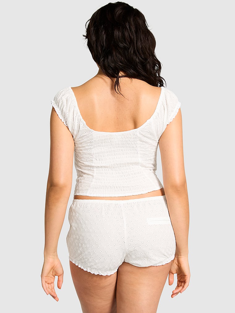 PINK by Frankies Bikinis Marilyn Eyelet Shorts, White Eyelet, onModelBack, 2 of 3 Isabella is 5'9" and wears Medium