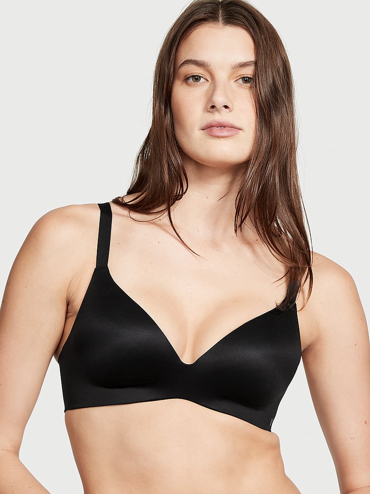 Victoria's Secret, Victoria's Secret Bare Infinity Flex Wireless Perfect Shape Bra, Black, onModelFront, 1 of 3 Mackenzie is 5'10" and wears 34B or Small