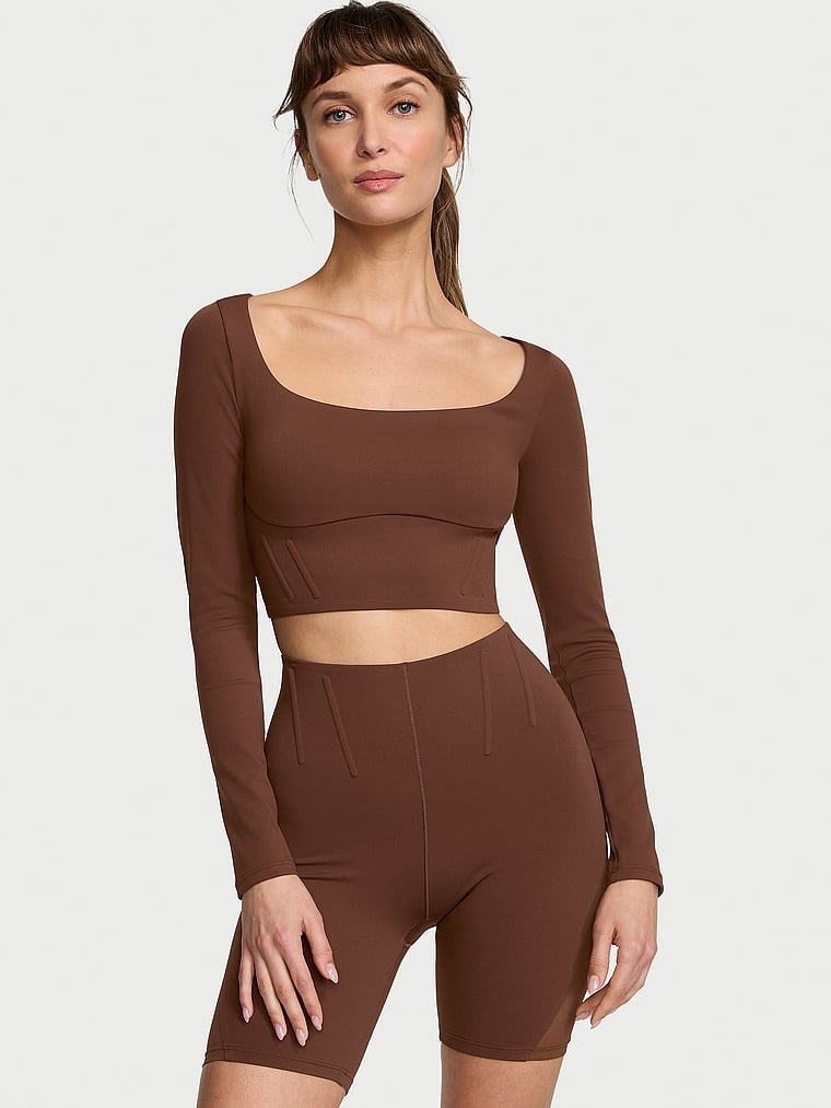Victoria's Secret, Victoria's Secret VS Elevate Cropped Long-Sleeve Corset Top, Ganache, onModelFront, 3 of 4 Ari is 5'9" or 175cm and wears Small