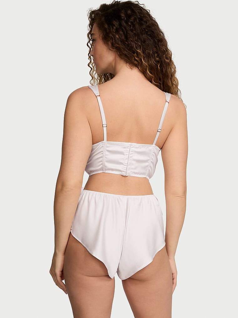 Victoria's Secret, Victoria's Secret Satin Corset Top & Shorts Set, Coconut White, onModelBack, 2 of 3 Kiana is 5'9" and wears Small