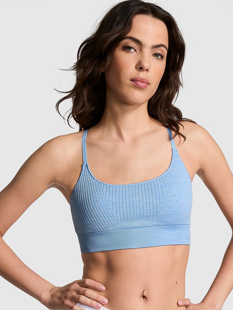 PINK Seamless Scoop Sports Bra, Denim Blue, onModelFront, 1 of 4 Scarlett is 5'11" or 180cm and wears 34B or Small