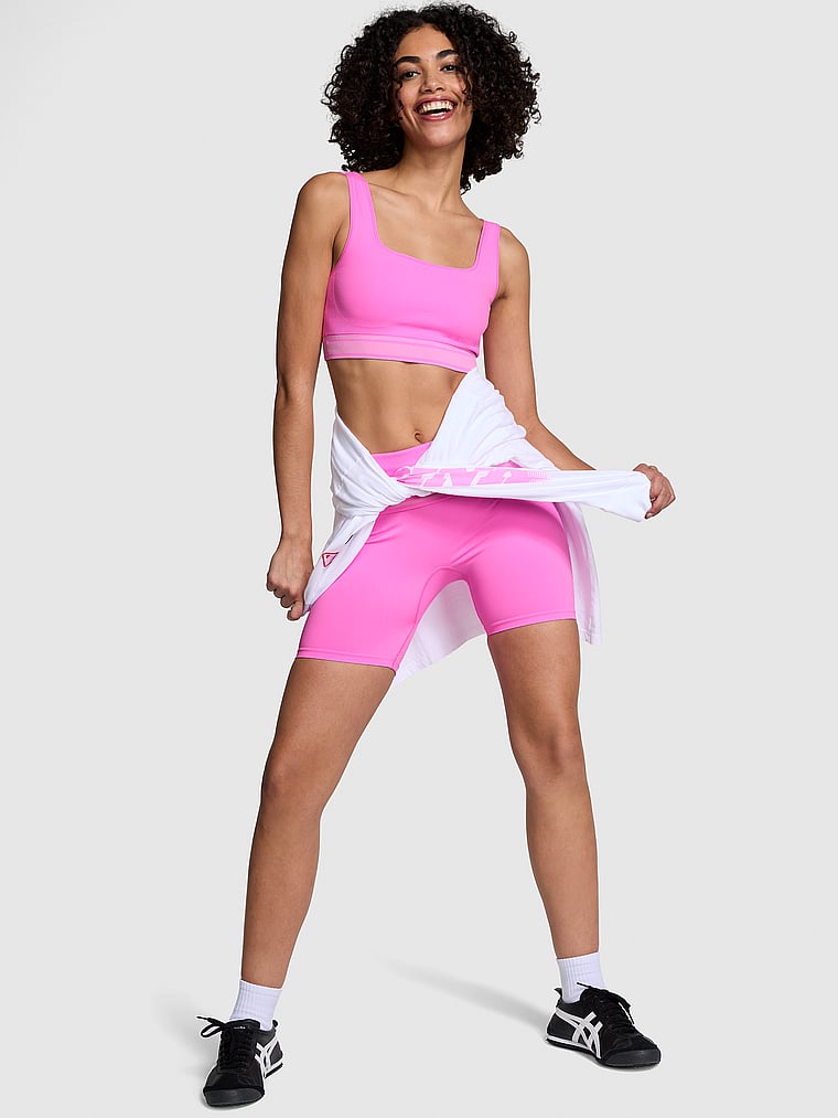 PINK PINK Flip It Seamless Foldover Bike Shorts, Pink, onModelSide, 1 of 4 Vanessa is 5'10" or 178cm and wears Small