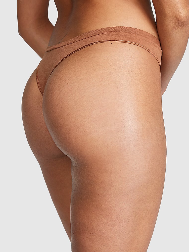 PINK Seamless High-Leg Thong Panty, Caramel, onModelBack, 2 of 3 Vanessa is 5'10" and wears Small