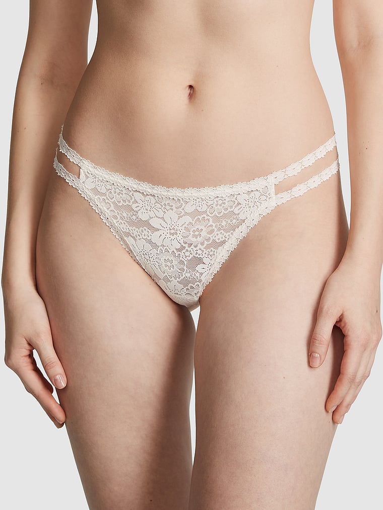 PINK Wink Strappy Thong Panty, Coconut White, onModelFront, 1 of 4 Anabel is 5'8" or 173cm and wears Small