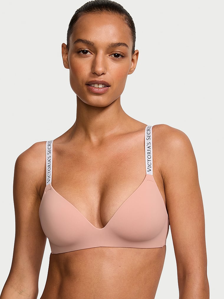 Victoria's Secret, The T-shirt Lightly Lined Wireless Bra, Misty Rose, onModelFront, 1 of 3 Nikita  is 5'10" and wears 34B or Small