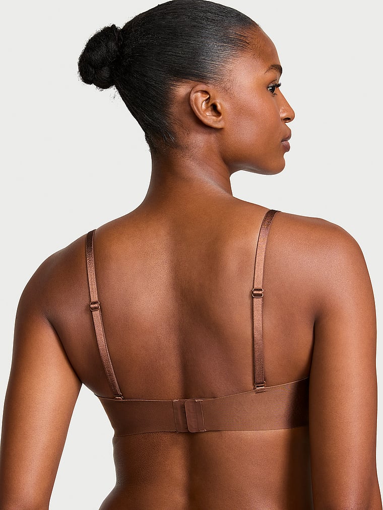 Victoria's Secret, Victoria's Secret Bare Illusions Lightly Lined Smooth Strapless Bra, Mousse, onModelBack, 2 of 3 Tsheca  is 5'9" and wears 34B or Small