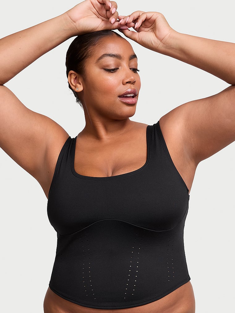 Victoria's Secret, VSX VS Essential Perforated Corset Top, Black, onModelFront, 4 of 5 Brianna is 5'10" and wears Extra Large