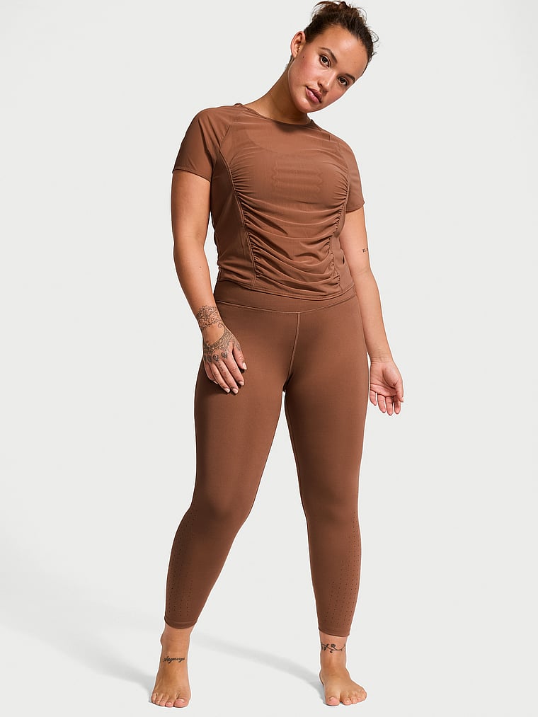 Victoria's Secret, VSX VS Essential High-Rise Perforated Leggings, Caramel, onModelSide, 3 of 5 Sofia  is 5'8" or 173cm and wears Large