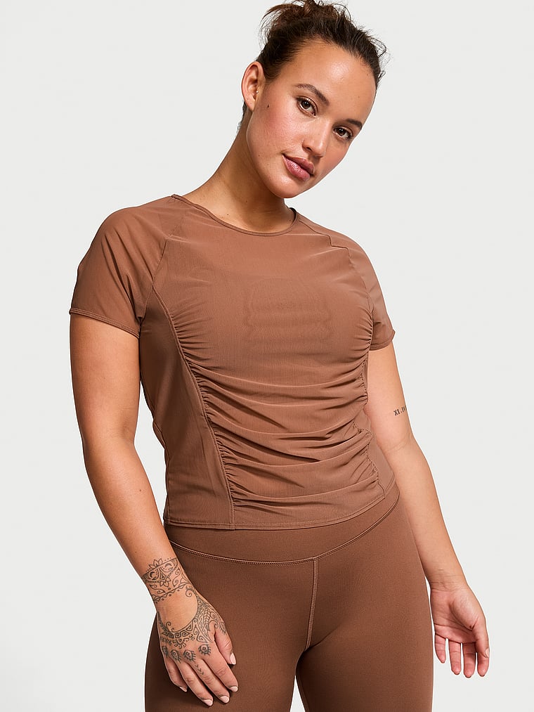 Victoria's Secret, VSX Mesh Ruched Tee, Caramel, onModelFront, 1 of 4 Sofia  is 5'8" or 173cm and wears Large