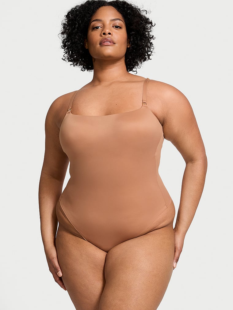 Victoria's Secret, Victoria's Secret Feathersoft Essentials Lightly Lined Bodysuit, Toffee, onModelFront, 1 of 4 Chloe is 5'11" and wears Extra Extra Large