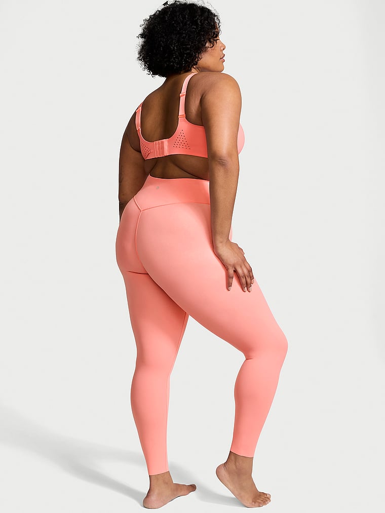 Victoria's Secret, VSX VS Elevate Light Compression Leggings, Coral Crush, onModelBack, 2 of 4 Chloe is 5'11" and wears Extra Extra Large