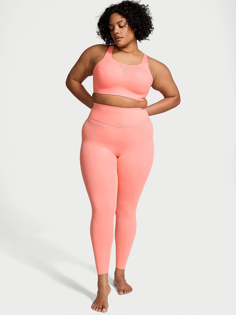Victoria's Secret, VSX VS Elevate Light Compression Leggings, Coral Crush, onModelFront, 1 of 4 Chloe is 5'11" and wears Extra Extra Large