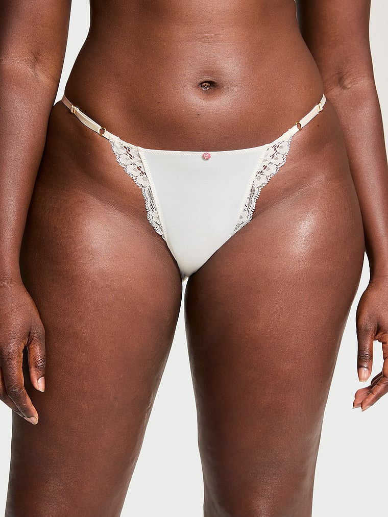 Victoria's Secret, Dream Angels Lace-Trim Adjustable String Bikini Panty, Coconut White, onModelFront, 1 of 3 Arame is 5'11" and wears Large