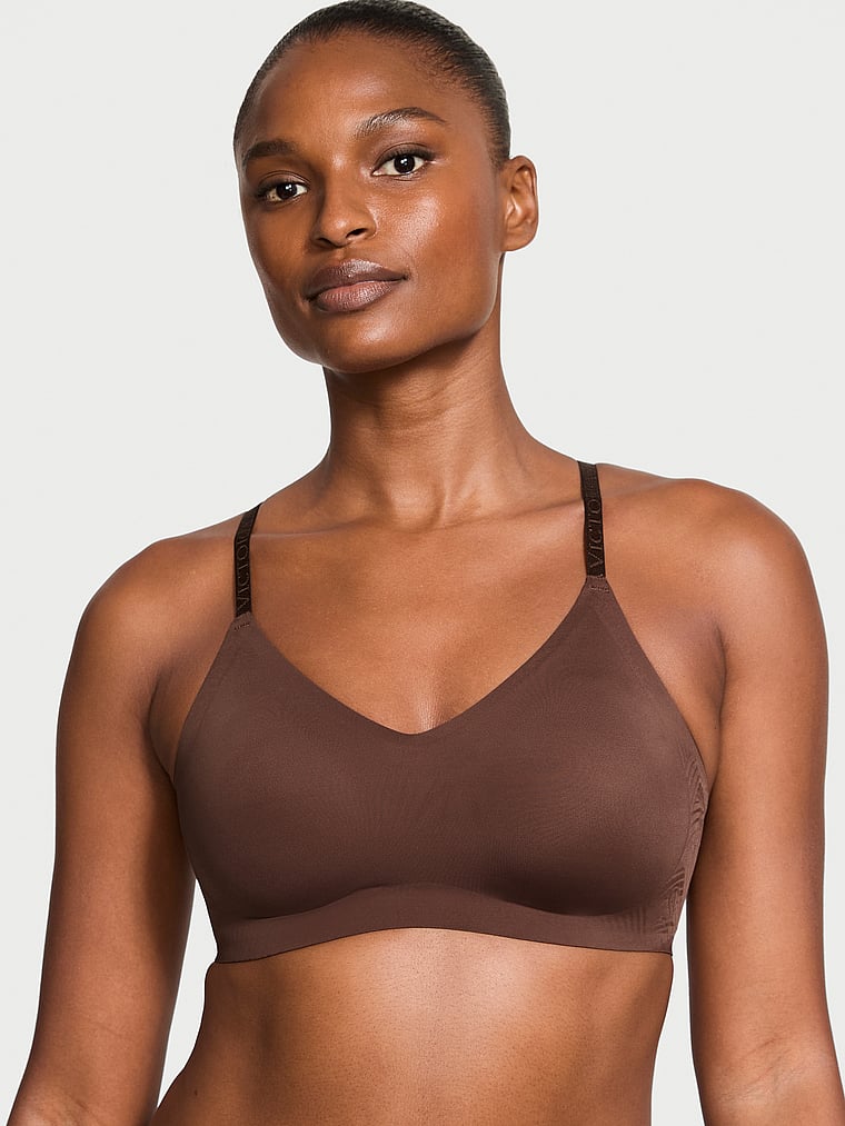 Victoria's Secret, Victoria's Secret Bare Lightly Lined Wireless Comfort Bra, Ganache, onModelFront, 1 of 3 Tsheca  is 5'9" and wears 34B or Small