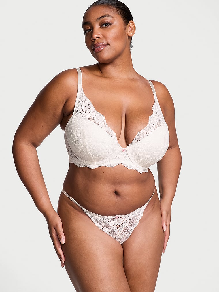 Victoria's Secret, Dream Angels Lace Adjustable String Bikini Panty, Coconut White, onModelSide, 1 of 4 Brianna is 5'10" and wears Large