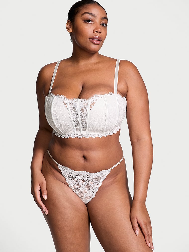 Victoria's Secret, Dream Angels Satin Bow Crotchless V-String Panty, Coconut White, onModelSide, 4 of 4 Brianna is 5'10" or 178cm and wears Large