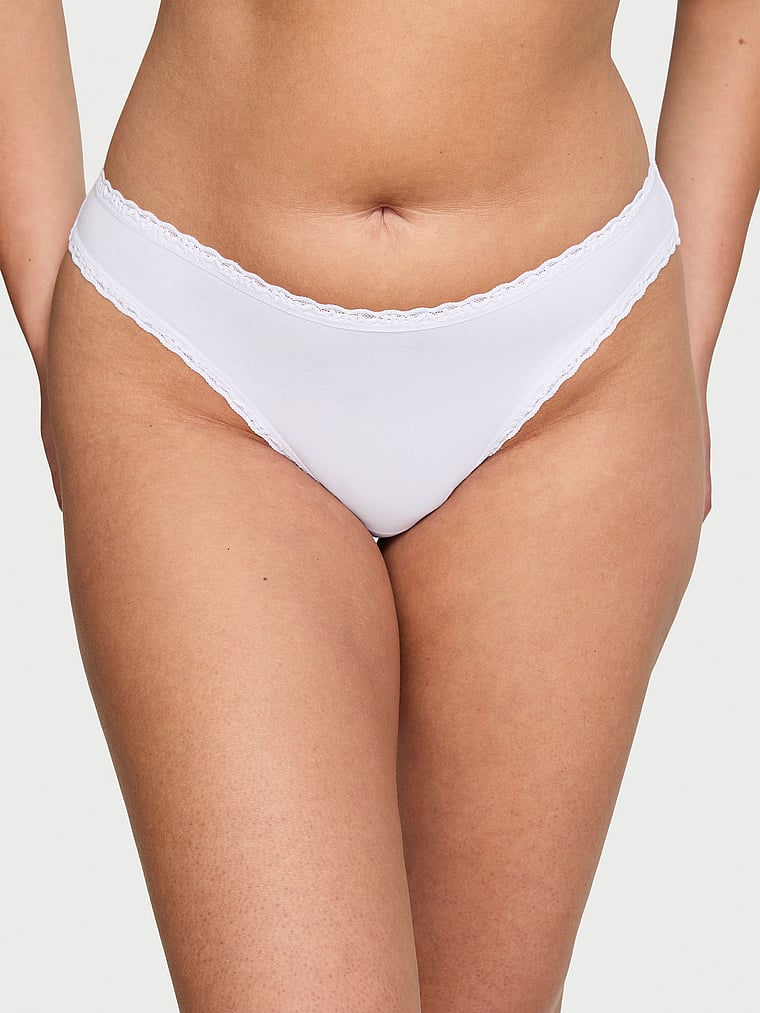 Victoria's Secret, Lace Trim Cotton Pointelle Lace-Waist Bikini, VS White, onModelFront, 1 of 3 Karmi is 5'10" and wears Large