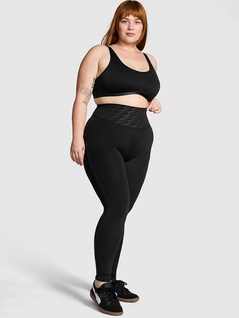 PINK Relay Compression Leggings, Pure Black, onModelFront, 1 of 3 Lulu is 5'7" or 170cm and wears Large