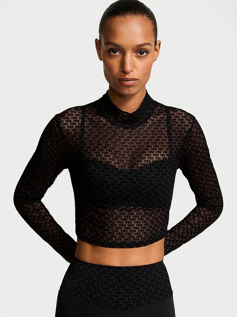 Victoria's Secret, VSX Logo Mesh Long-Sleeve Tee, Black, onModelFront, 1 of 4 Nikita is 5'10" or 178cm and wears Small