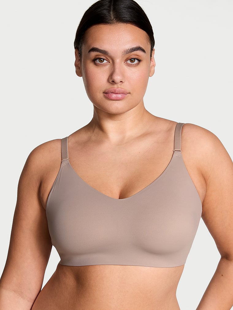 Victoria's Secret, VSX VSX Elevate™ Stretch-Comfort Sports Bra, Bare Taupe, onModelFront, 1 of 4 Karmi is 5'10" and wears 34DD (E) or Large