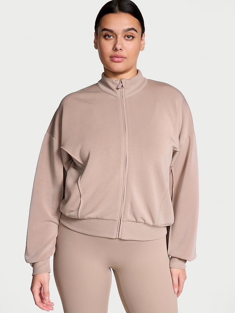 Victoria's Secret, VSX Featherweight Knit Full-Zip Jacket, Bare Taupe, onModelFront, 3 of 4 Karmi is 5'10" and wears Large