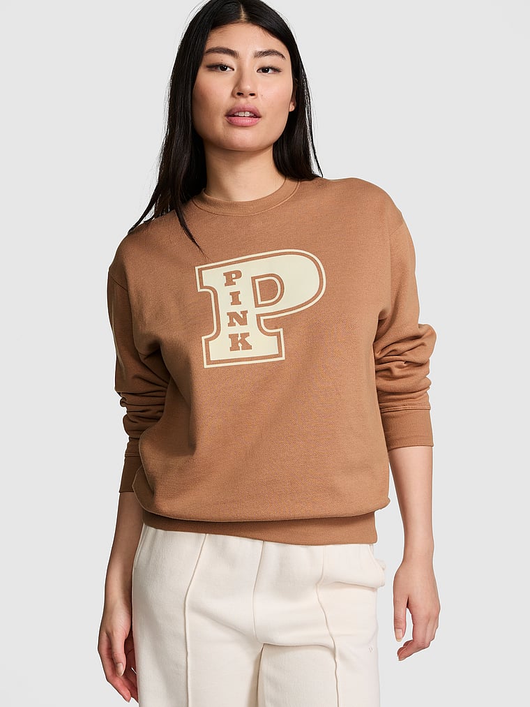 PINK Ivy Fleece Classic Crew Sweatshirt, Toffee, onModelFront, 1 of 3 Gloria is 5'9" and wears Small