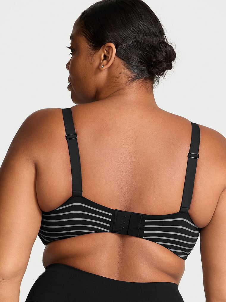 Victoria's Secret, VSX VSX Glow Reflective Balconette Sports Bra, Black, onModelBack, 4 of 4 Brianna is 5'10" or 178cm and wears 38DD (E) or Extra Large