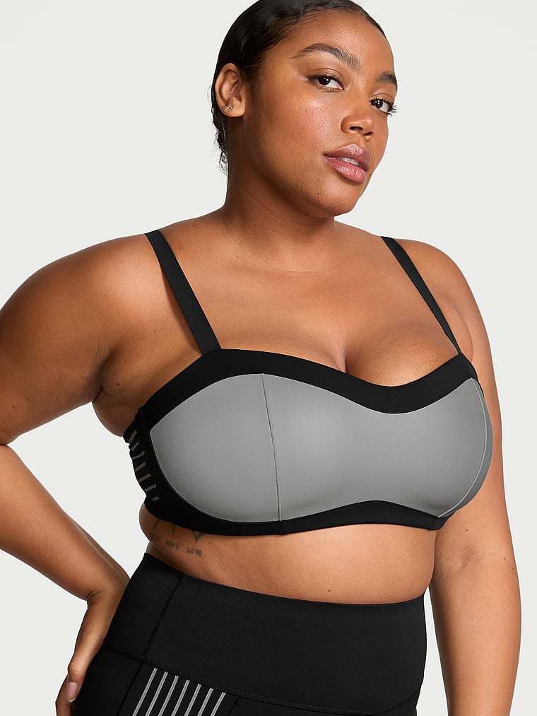 Victoria's Secret, VSX VSX Glow Reflective Balconette Sports Bra, Black, onModelFront, 3 of 4 Brianna is 5'10" or 178cm and wears 38DD (E) or Extra Large