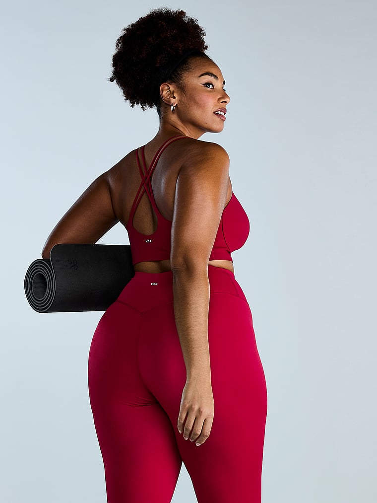 Victoria's Secret, VSX VSX Elevate™ Strappy-Comfort Sports Bra , Red Lacquer, onModelSide, 4 of 4 Shadia is 5'11" and wears 38DD (E) or Extra Extra Large