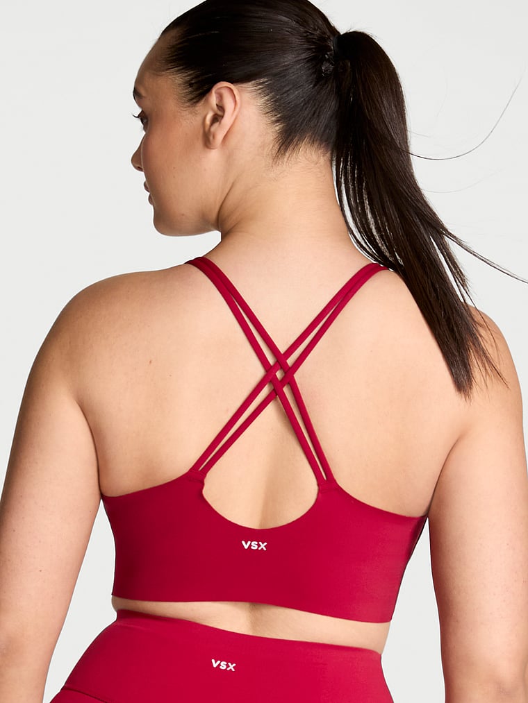 Victoria's Secret, VSX VSX Elevate™ Strappy-Comfort Sports Bra , Red Lacquer, onModelBack, 2 of 4 Karmi is 5'10" and wears 34DD (E) or Large