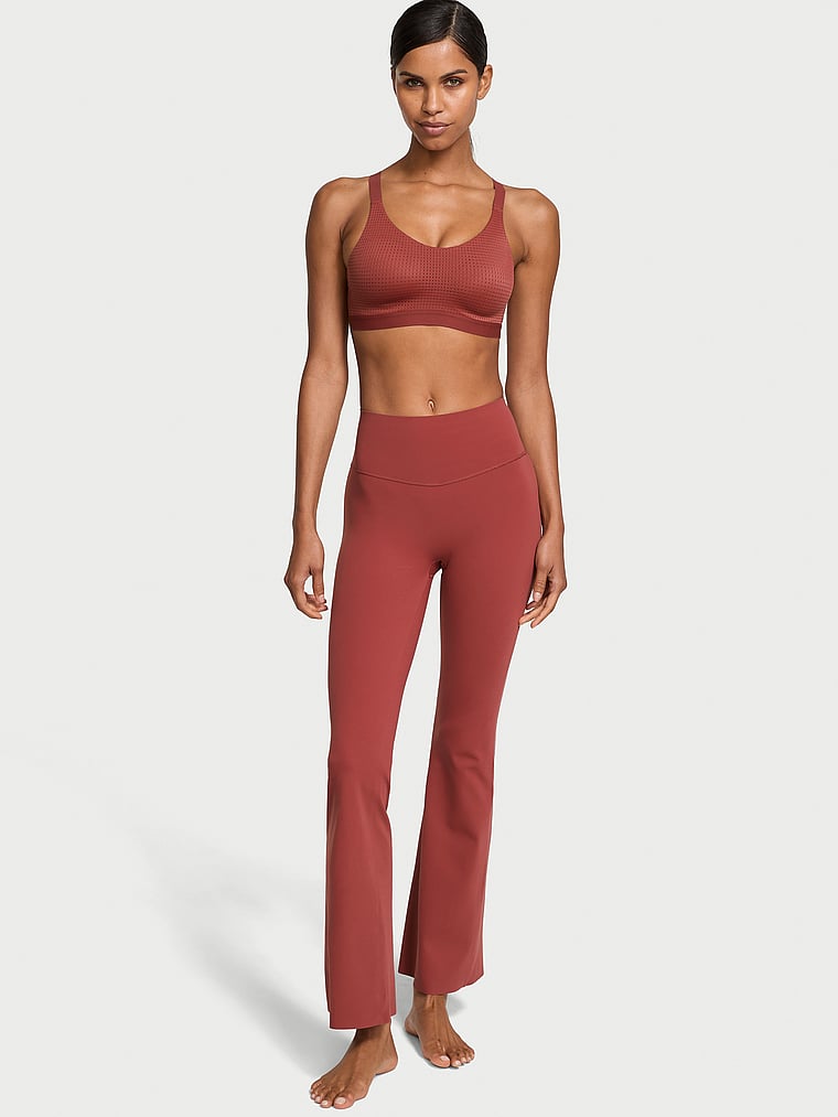 Victoria's Secret, VSX VSX Elevate™ Flare Legging, Russet, onModelFront, 1 of 4 Daiane is 5'11" or 180cm and wears Small