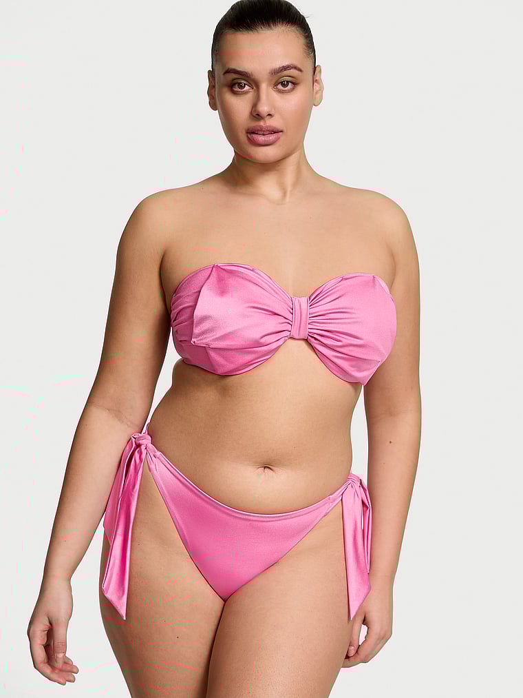 Victoria's Secret, Victoria's Secret Swim VS Archives Bow Bandeau Strapless Bikini Top, New Peony, onModelFront, 1 of 3 Karmi is 5'10" or 178cm and wears 34DD (E) or Large