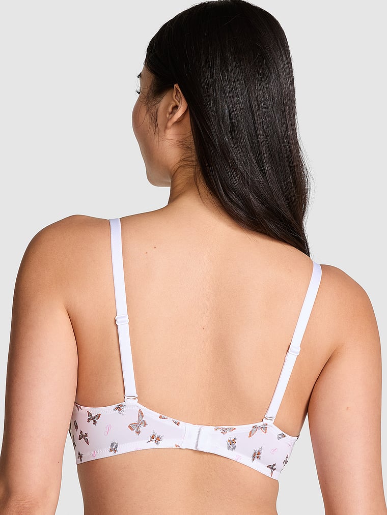 PINK Wear Everywhere Wear Everywhere Push-Up Bra, White Butterfly Print, onModelBack, 2 of 4 Gloria is 5'9" and wears 34D or Small