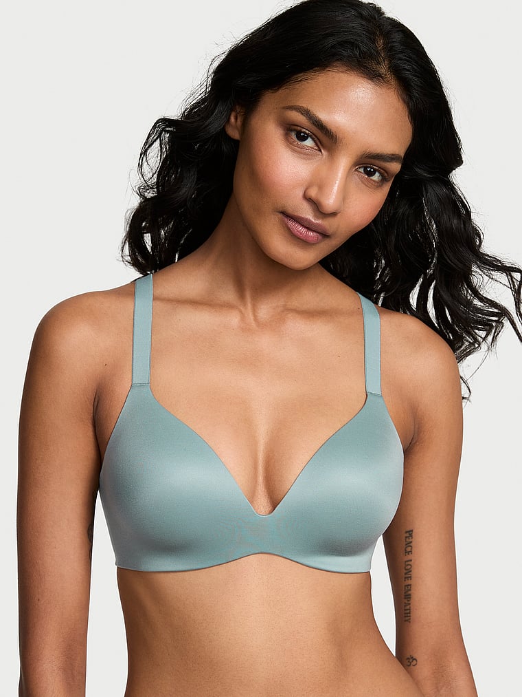 Victoria's Secret, Victoria's Secret Bare Infinity Flex Lightly Lined Wireless Plunge Bra, Jupiter Blue, onModelFront, 1 of 3 Shaanti is 5'9" and wears 32B or Small
