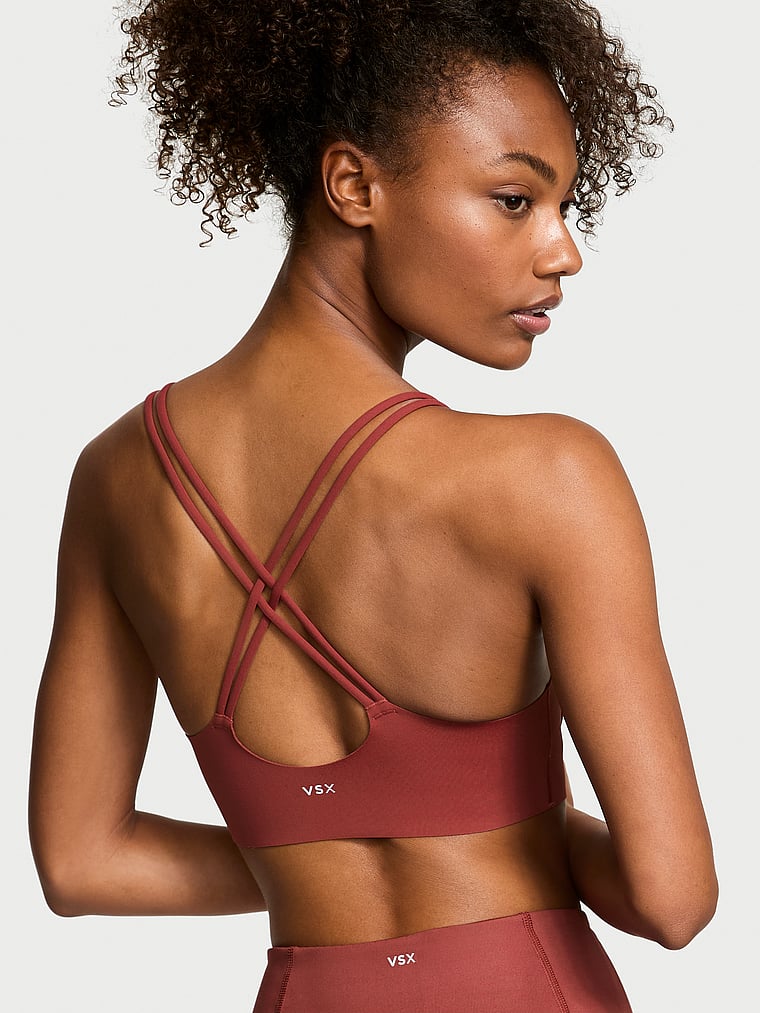 Victoria's Secret, VSX VSX Elevate™ Strappy-Comfort Sports Bra , Russet, onModelBack, 2 of 3 Ange-Marie is 5'10" and wears 34B or Small