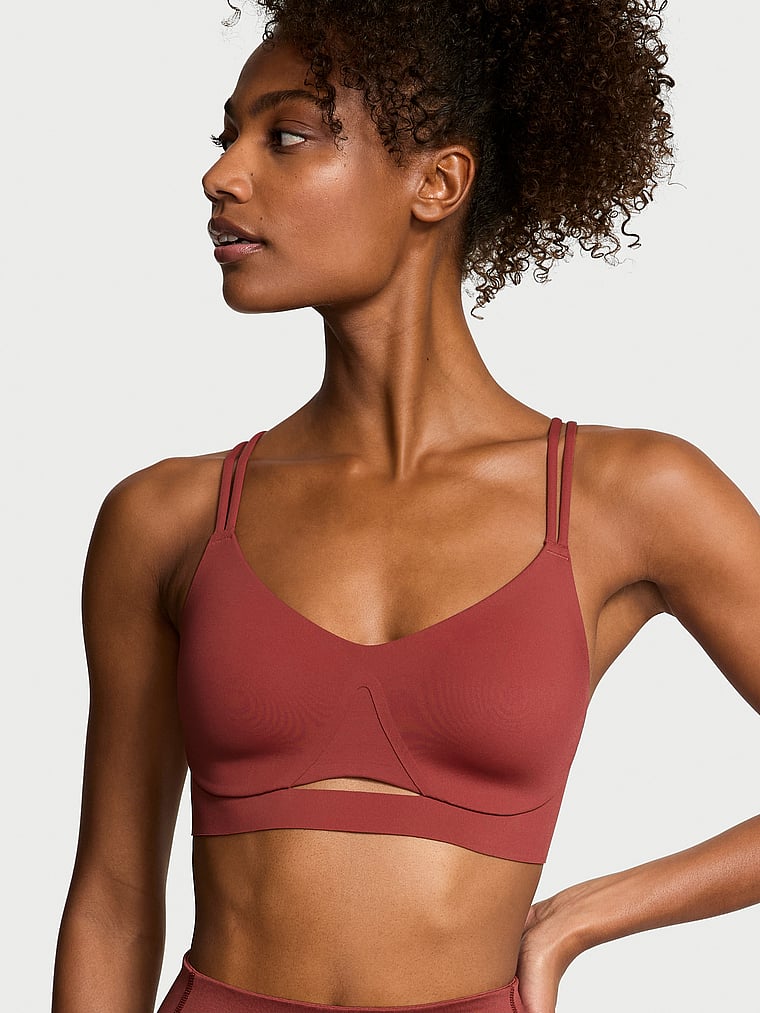 Victoria's Secret, VSX VSX Elevate™ Strappy-Comfort Sports Bra , Russet, onModelFront, 1 of 3 Ange-Marie is 5'10" and wears 34B or Small