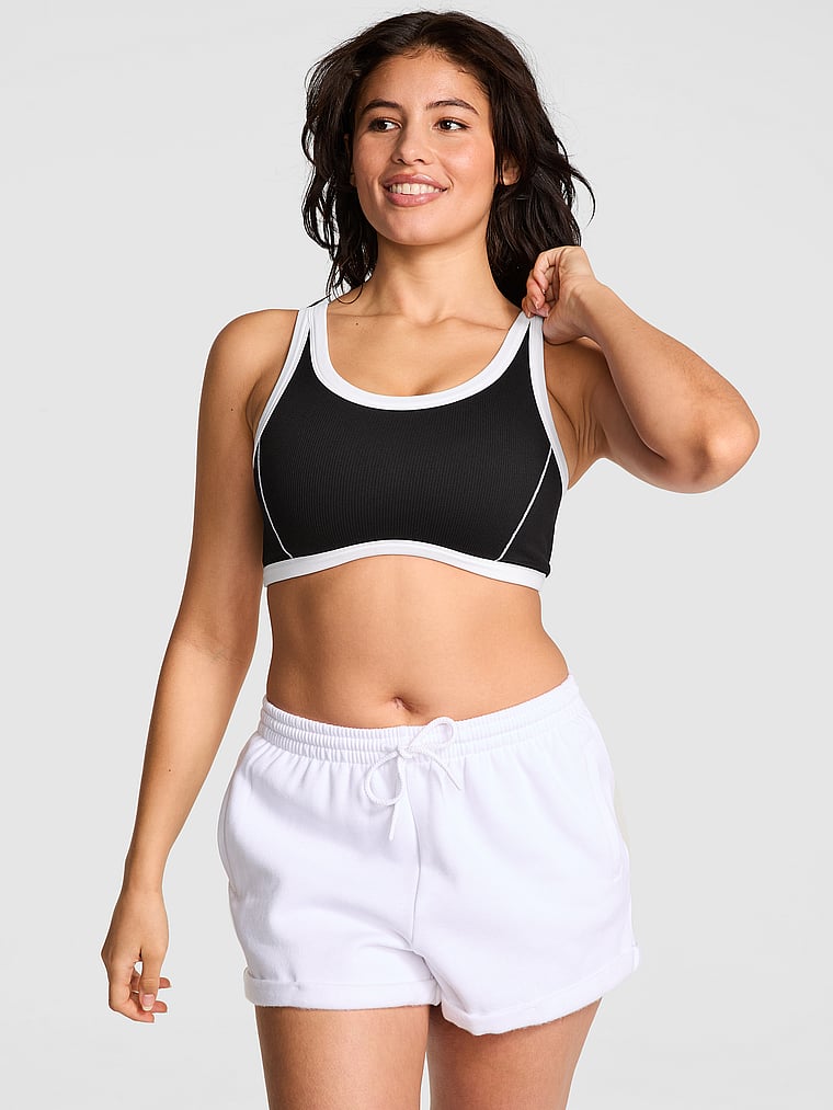PINK The Wave Soft Seamless Contour Sports Bra, Pure Black, onModelFront, 1 of 4 Isabella is 5'9" or 175cm and wears 36B or Medium