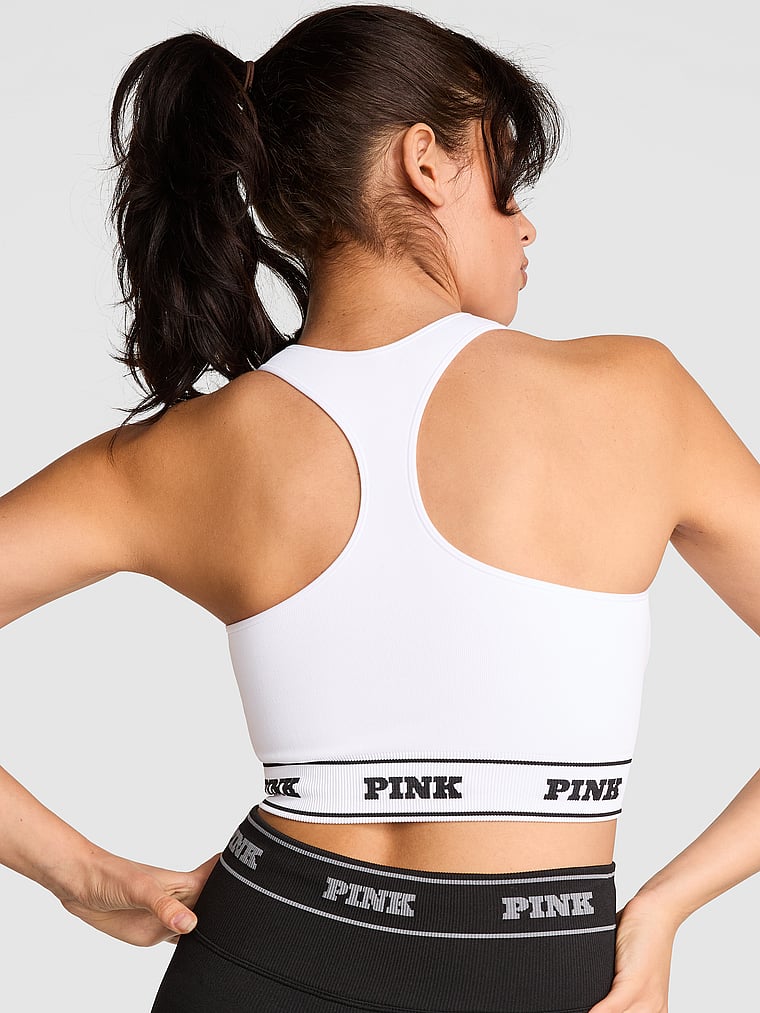 PINK Seamless Reversible Sports Bra, Vs White, onModelBack, 2 of 3 Isabella is 5'9" or 175cm and wears 36B or Medium