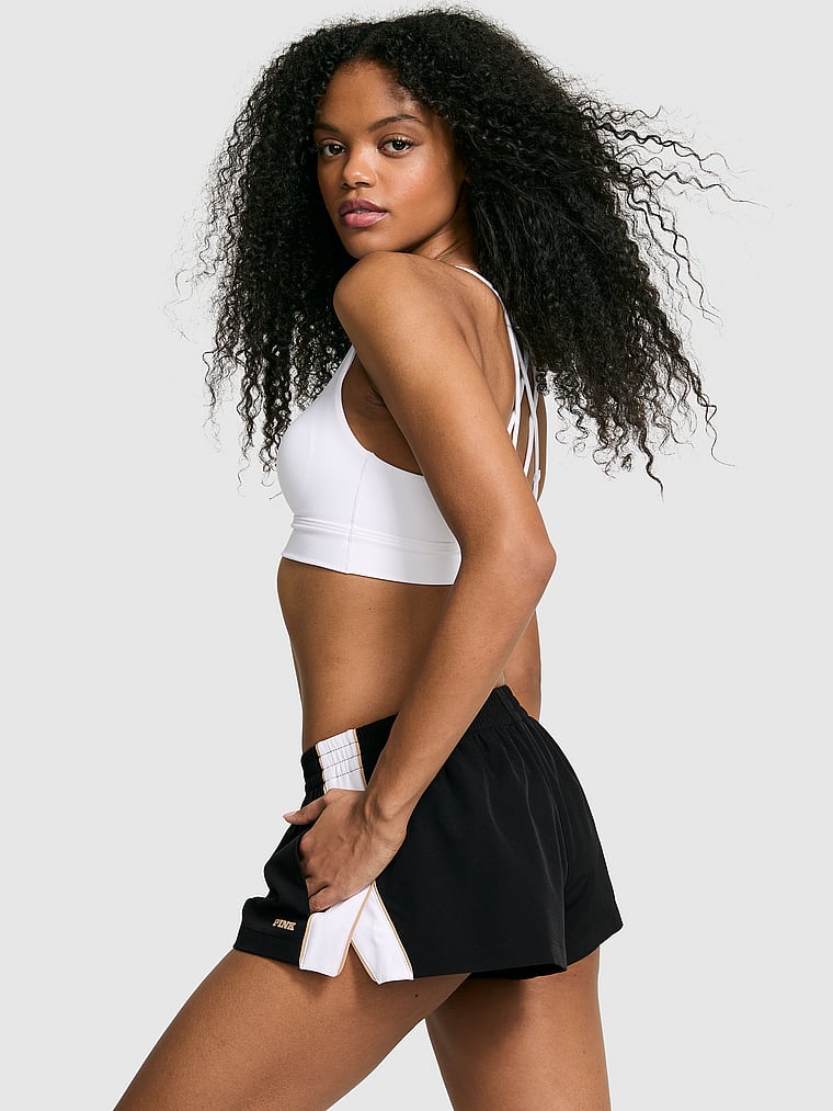 PINK Tech Woven Retro Shorts, Pure Black, onModelBack, 2 of 3 Jordan is 5'9" or 175cm and wears Small