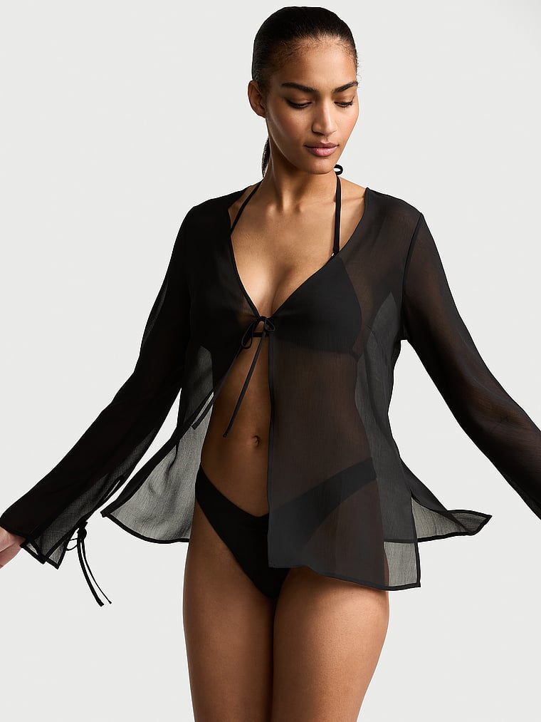 Victoria's Secret, Victoria's Secret Swim Beachwear Sheer Crinkle Tie-Front Long-Sleeve Top, Black, onModelFront, 1 of 3 Anyeline is 5'10" or 178cm and wears Small